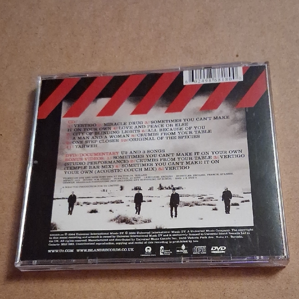U2 "How to Dismantle an Atomic Bomb" CD/DVD & "War" CD - Picture 9 of 13